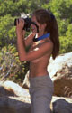 Temptress posing outdoors